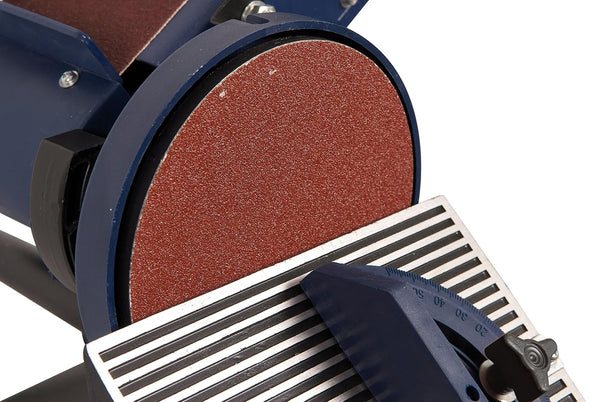 Close-up of a belt sander with sandpaper on a white background