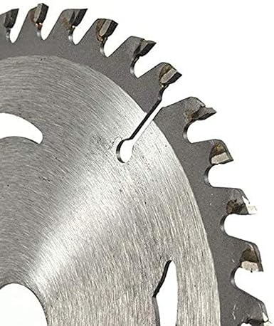 Close-up of a circular saw blade on a white background