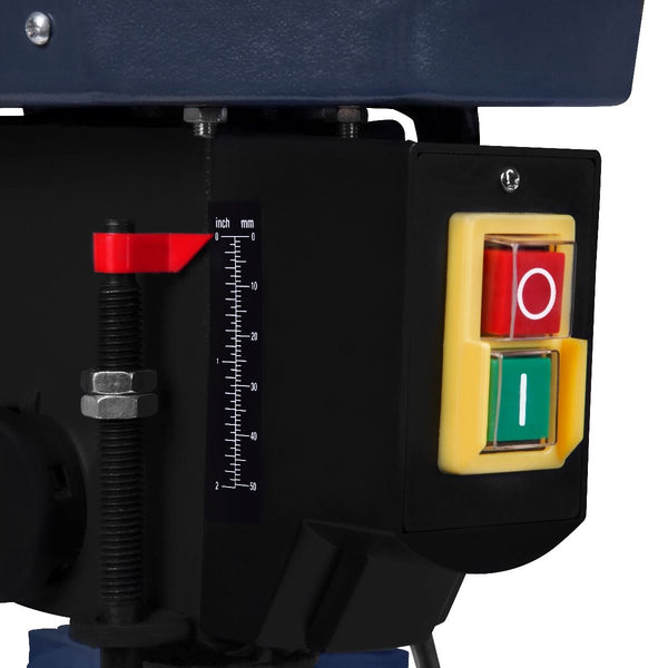 Control panel with red and green buttons on a machine